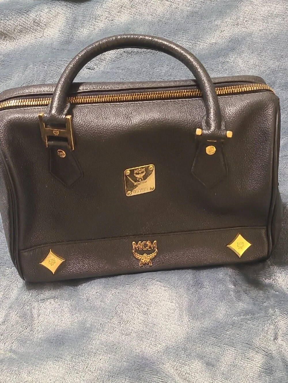 MCM Black Leather Bag with Gold Logo Plate